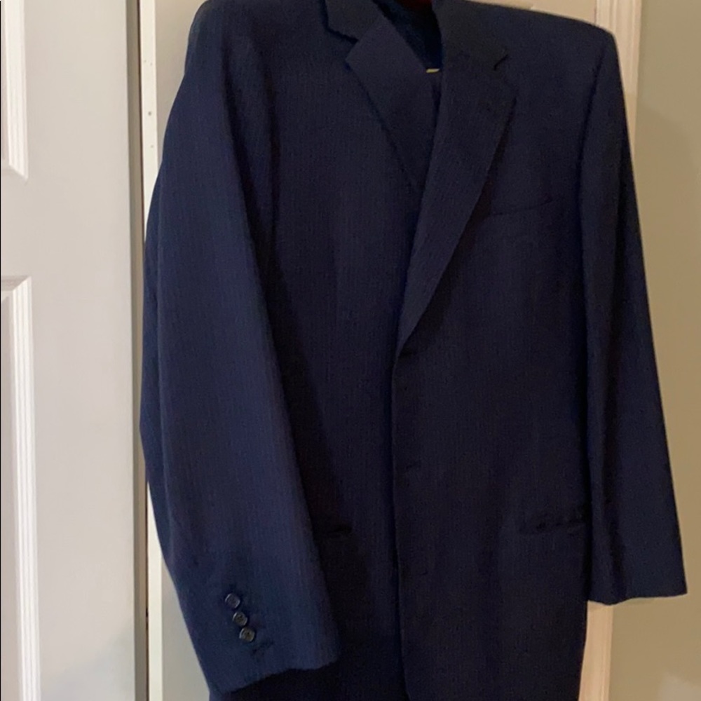 custom suit with functional buttonholes